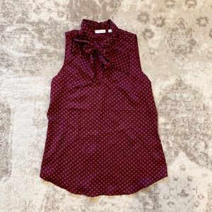 Eva Mendez Sleeveless Satin Bow Blouse